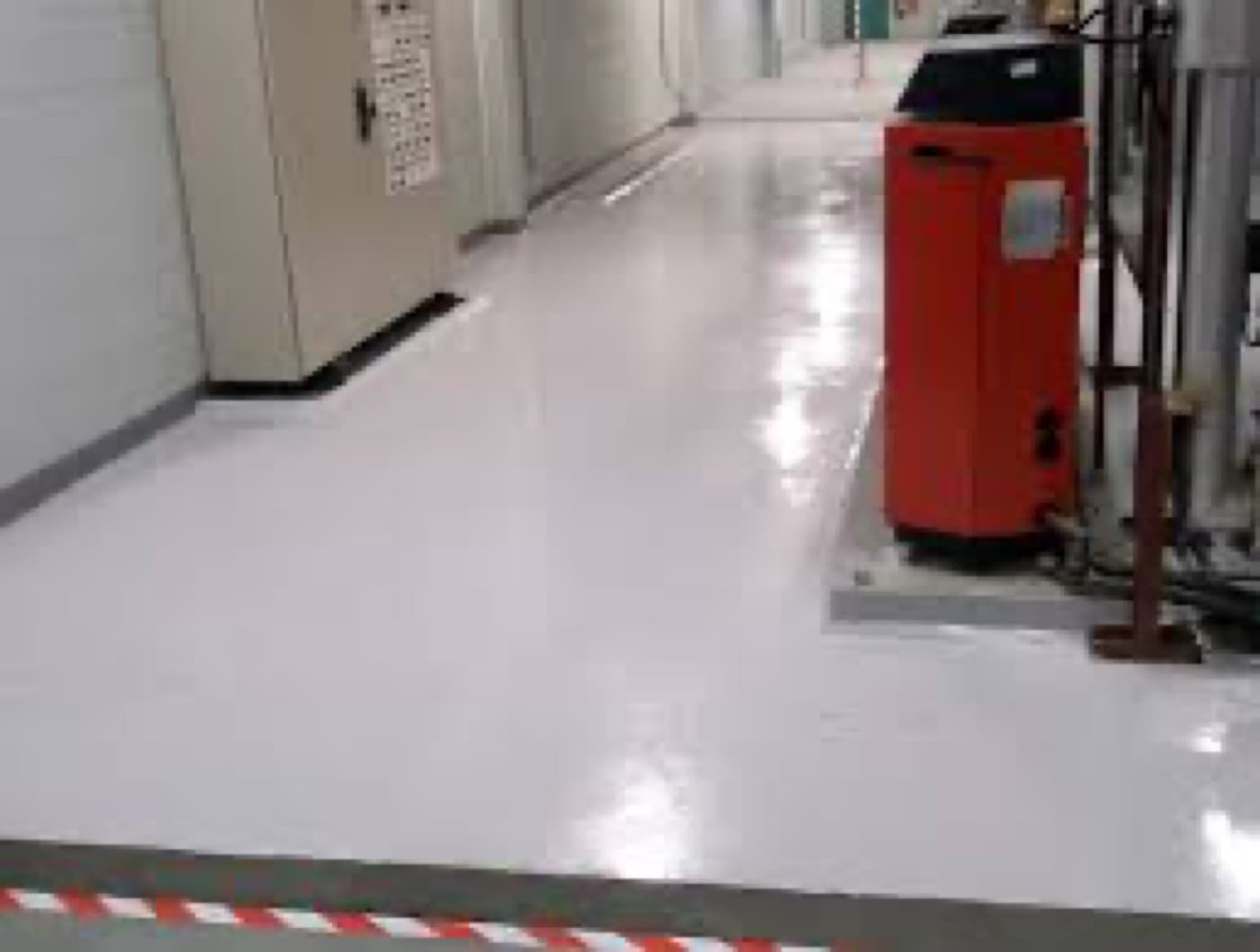 Chemical-resistant process floor repaired and resurfaced by CM Solutions US in a sugar mill
