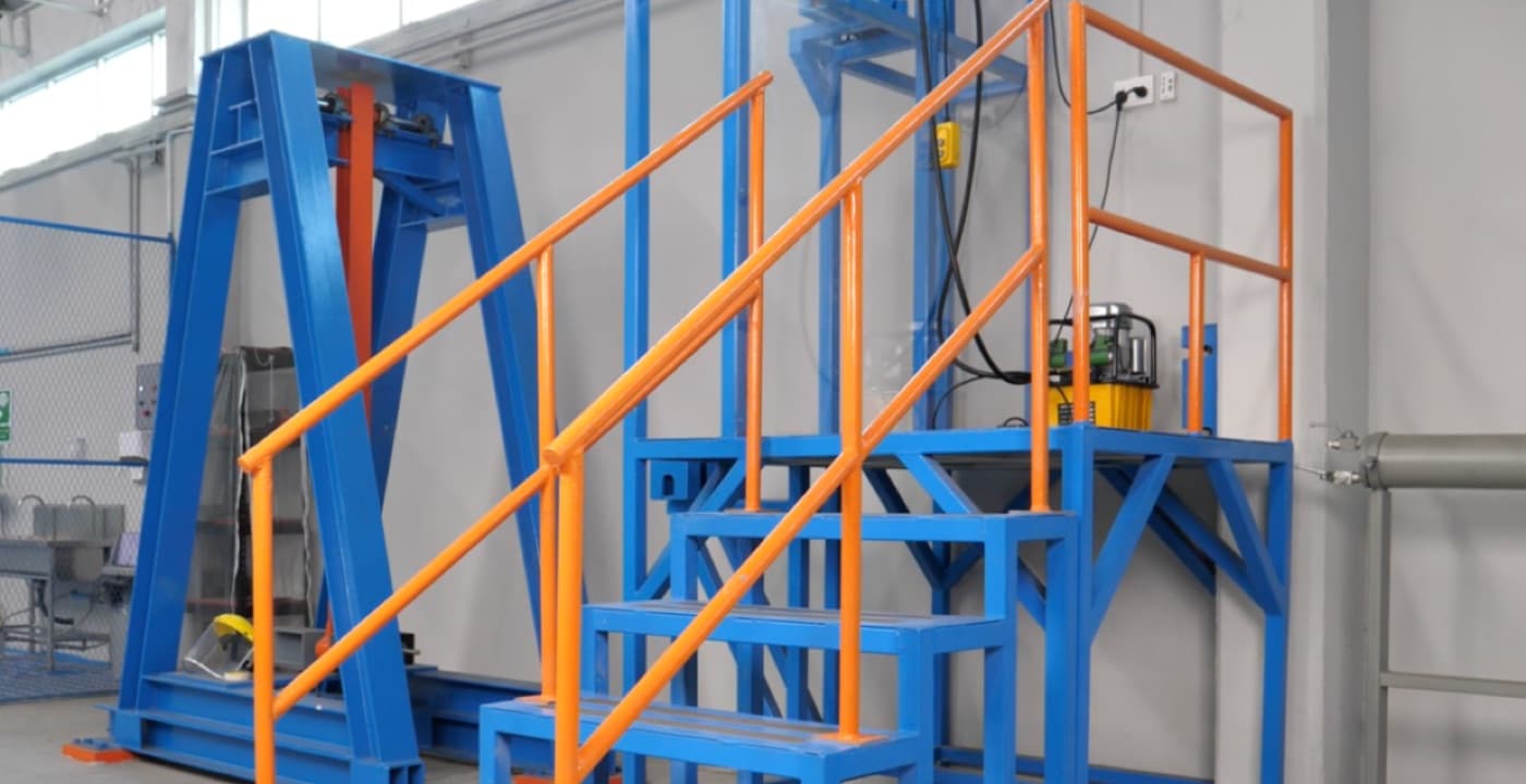 Corroded handrail stanchion rebonded and anchored to a steel-mill walkway by CM Solutions US