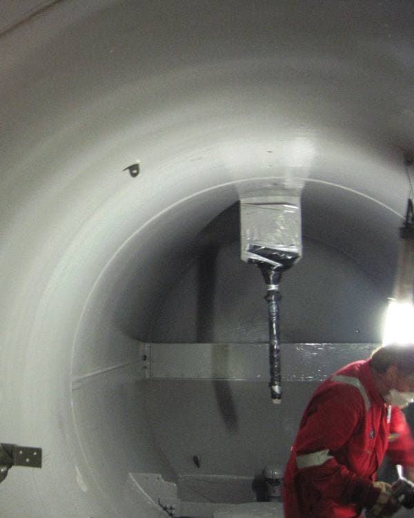 A CM Solutions US applicator applying a Belzona protective coating